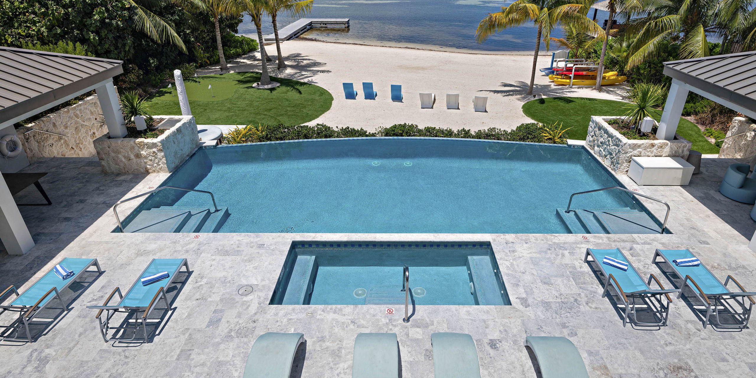 64441e8a3621c_SR_WEB_daytime_upstairs_balcony_view_pool_ocean_2023