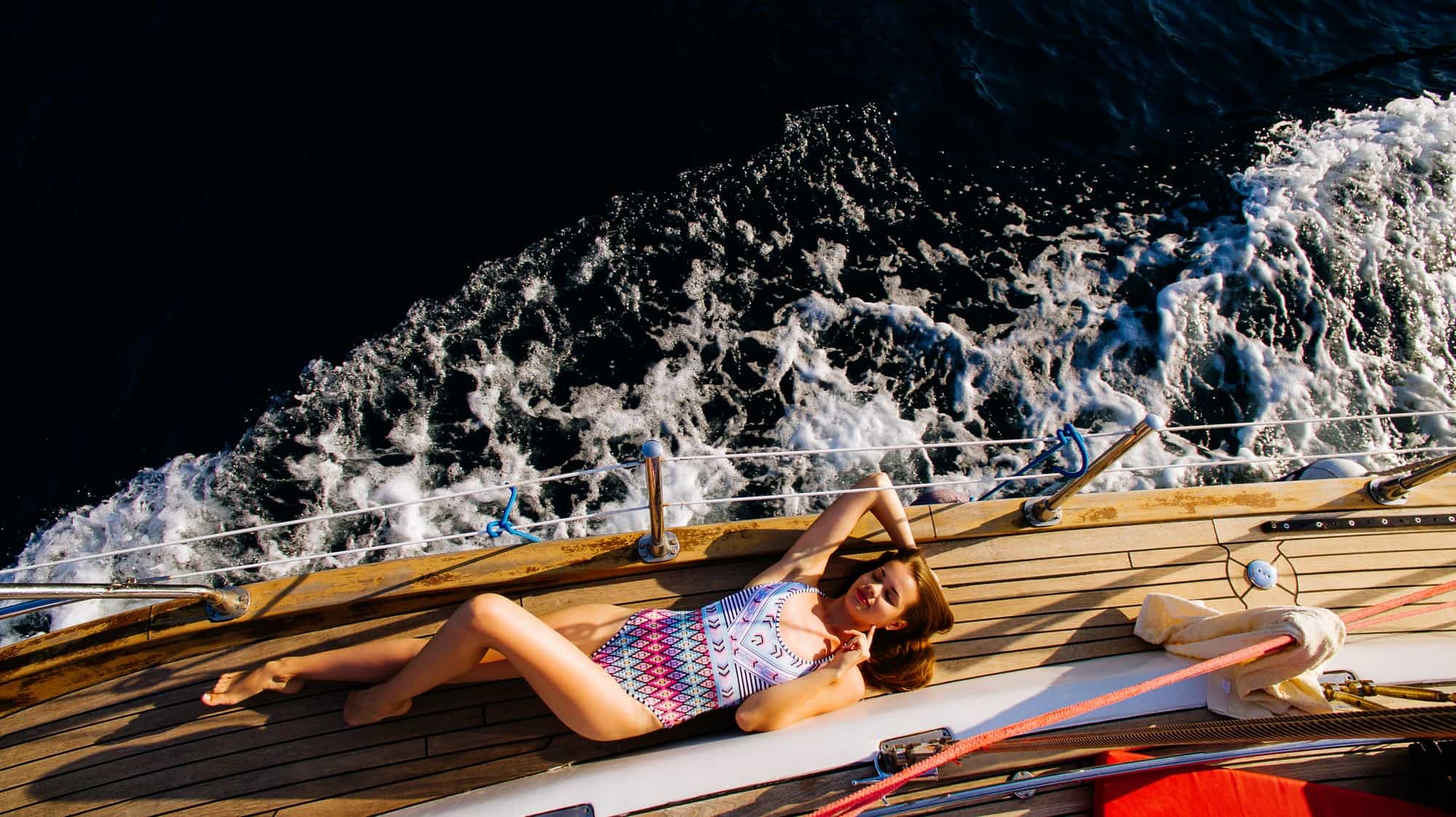 luxury-woman-yachting-in-sea-top-view
